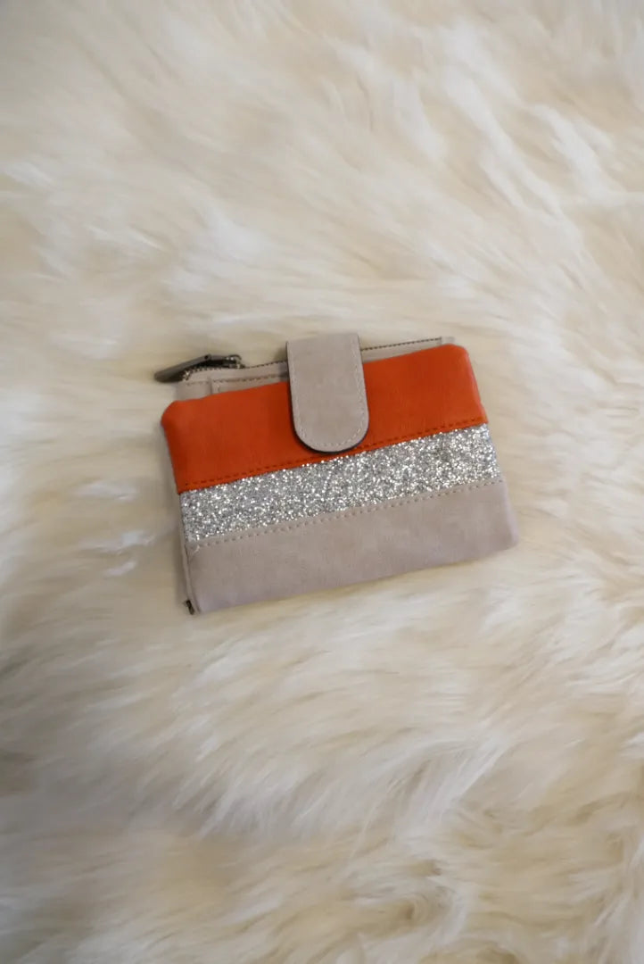 Lompakko kimalleraidalla