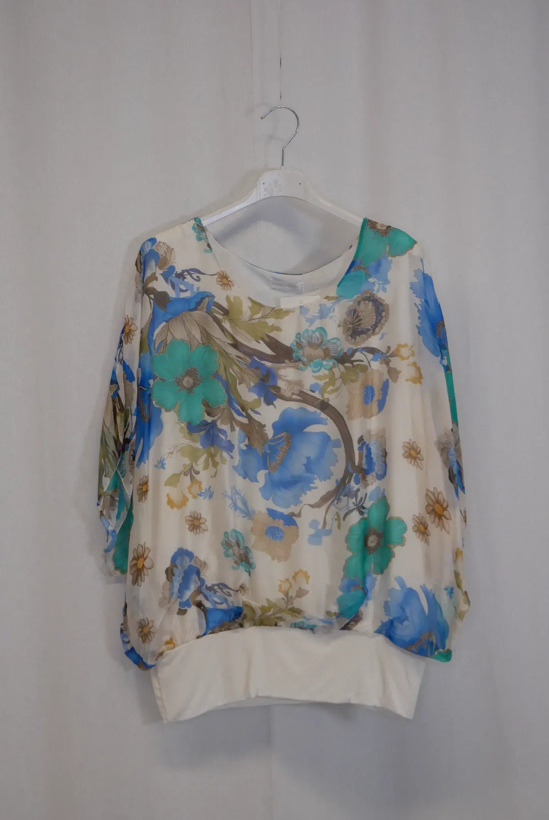 Silkkipaita resorilla Taina